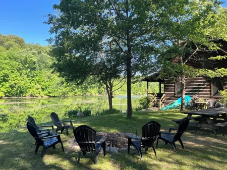 Unique Log Cabin Retreat on 138 Acres, swim, fish, boat, paddleboard, kayak!