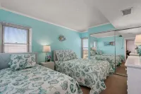 Beautiful Pup-Friendly Beachfront - Top Floor End Unit with Spectacular Views!