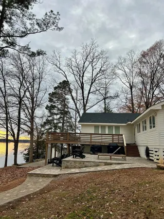Newly renovated beauty on main lake with sunrise to sunset panoramic views!