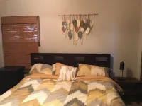 Fully furnished 3 bedroom ranch style home with large screened in porch w/garage