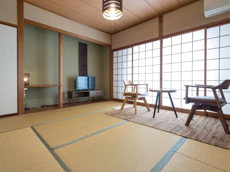 Auberge Arigato Отели рядом с достопримечательностью «Takachiho Farm»