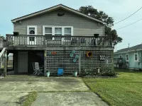 COZY COMFORT between the bay and the ocean.