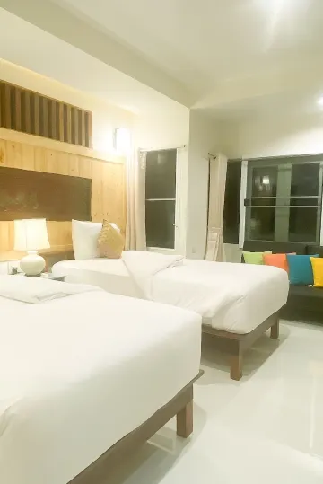 ห้องดีลักซ์สามคน หลายเตียง วิวสวน