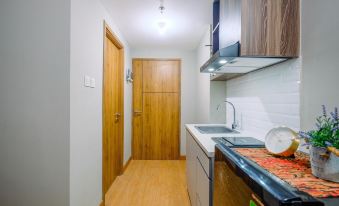 Comfortable Pool View Studio Room at Gateway Park LRT City Bekasi Apartment