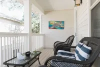 5 Mins to Beach Shared Pool Covered Deck Bikes Heron Cottage by AvantStay