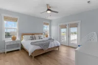 Luxurious Amenities and Steps to the Shoreline - Elegant Coastal Retreat