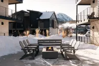 Scenic Patio with River View and Hot Tub - Cozy Mountain Retreat