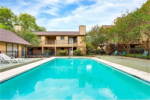 Private Balcony and Inviting Pool Access - Charming Two-Story Retreat