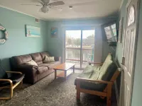 2nd Floor 3 BR Condo Close to the beach with Pool!