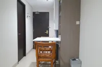 Cozy Studio Room at Patraland Amarta Apartment - Business
