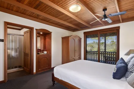 O'Reilly's Rainforest Retreat Отели в г. Тайалгам