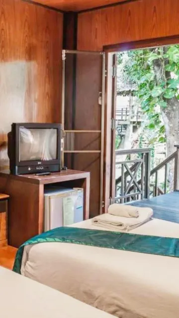 ห้องดีลักซ์ เตียงแฝด พร้อมวิวสวน