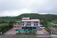 Hotel White Lotus Hotels near Kali Kalyan Dham shakti peeth,Varda