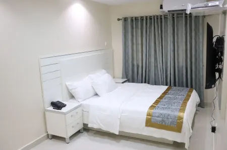 Appleville Suites Отели рядом с достопримечательностью «Kalakuta Museum»