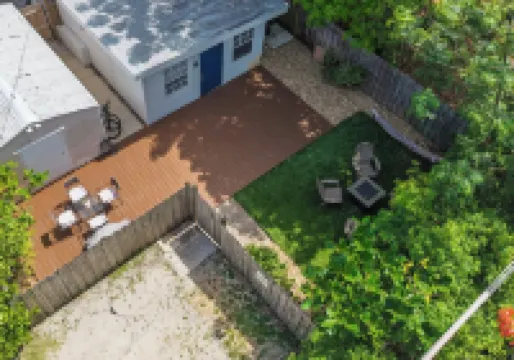 Cozy Coastal Retreat! Fenced Turf Yard • Bikes • Hammock • BBQ • 65” TV