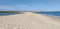 Large house on a hill with a spectacular view over the sea and mountains