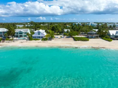 7 Mile Beach views from the Roof terrace. Luxury Condo with Private Beach Club