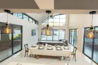 Modern 4-bedroom house in enchanting Victoria Falls with AC, Pool & WiFi