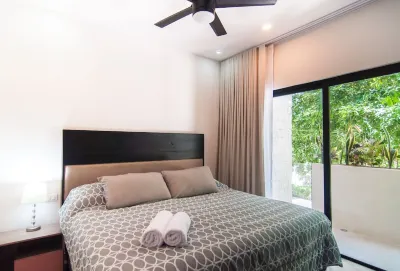 Serene Ambiance:New Exquisite 2BR,Gated Grand Sirenis, Near popular attractions