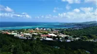 MILLION DOLLAR VIEW SET ATOP ONE ACRE OF CARIBBEAN SLENDOR