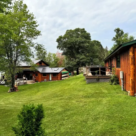 Welcome to Shangri-Lodge Your 2 cabin retreat on a family friendly lake.