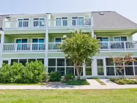 Steps away from the Ocean,  Gym, Gazebos, Indoor/Outdoor  Pools, & Tennis Courts Hotels in Emerald Isle