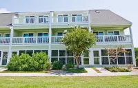 Steps away from the Ocean,  Gym, Gazebos, Indoor/Outdoor  Pools, & Tennis Courts
