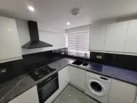 A comfortable and modern apartment complex with a warm and homely feeling.