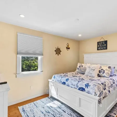 Charming Seaside Cottage Sleeps 9 with WiFi, AC, 2 Min Walk to a Private Beach