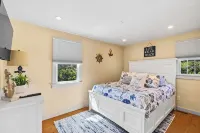 Charming Seaside Cottage  Sleeps 9 with WiFi, AC, 2 Min Walk to a Private Beach
