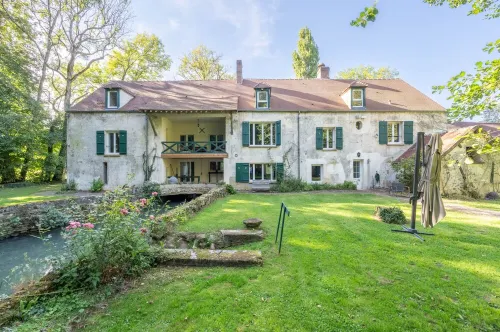 Old mill with river - a haven of peace in the heart of nature