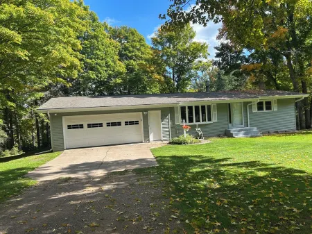 3-bedroom house located three miles from Sawyer Lake on the Michigamme River