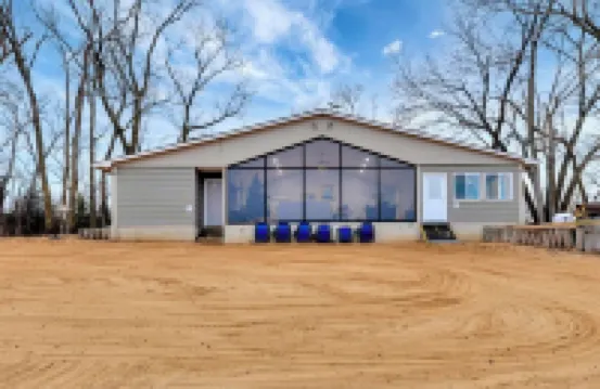 Private Lake Resort house w swimming, fishing, beach access, sand dune ATV Park