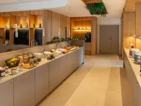 科爾瑪中心恩特林頓美居飯店 - 早餐