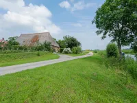 Farmhouse by Lauwers River with Rowing Boat - Apartments