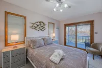Lakefront Retreat With a Large Yard, Stone Fire Pit, Gazebo, Deck, & Dock - 4-Star