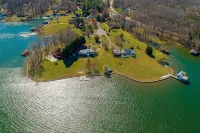 Lakefront Retreat With a Large Yard, Stone Fire Pit, Gazebo, Deck, & Dock - 4-Star