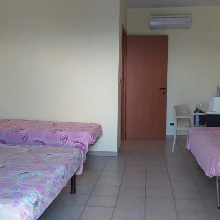 Quadruple Room in Pineto - Just a Few Meters from the Sea.