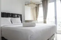 Minimalist Studio Apartment at Poris 88 with City View