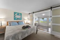 The Beach Retreat is a cozy beach Villa with Hottub overlooking a private beach.