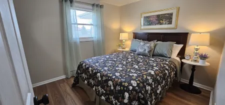 Relax and unwind in this colorful home close to hospitals and colleges!