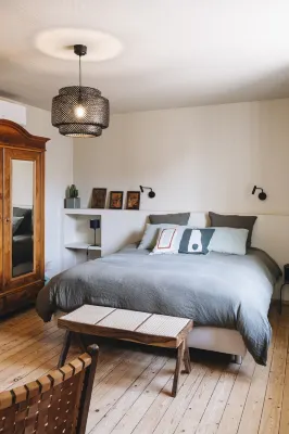 10 min walk from town center: large town house with small garden