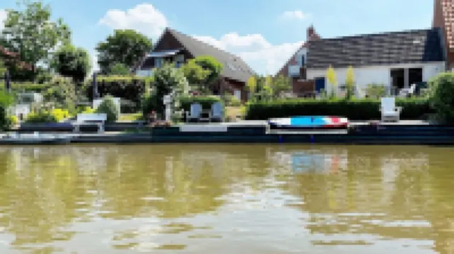 Fernblick: Chic, Colorful 2-Room Apartment with Balcony in a Top Location Directly on the Siel