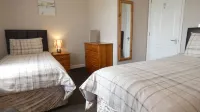 Two Bedroomed Holiday Cottage With Sea Views just one mile from the beach
