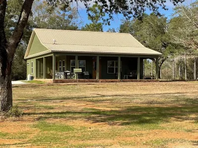 Private and peaceful setting surrounded by Longleaf Pines on the Perdido River Hotels near Perdido Vineyards