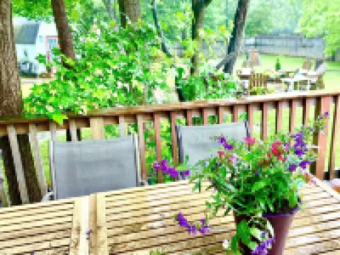 Private cottage located on The Carriage House Inn Estate Hotels in Mena