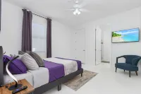 Deluxe 4BD/3BH Waterfront Home with Heated Pool and Golf Access and EV Charger