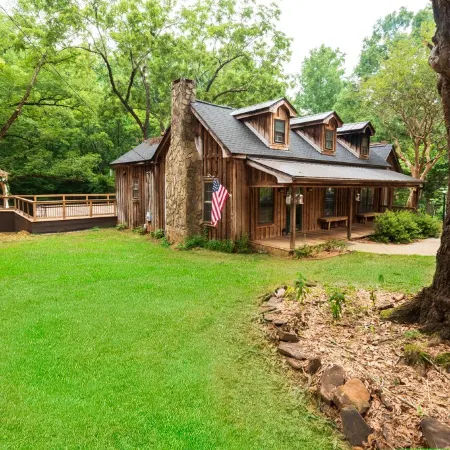 Vintage charm meets modern comfort in this historic 1850s cabin at Lake Hartwell