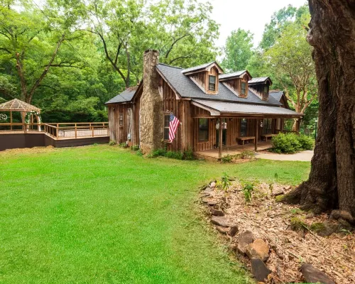 Vintage charm meets modern comfort in this historic 1850s cabin at Lake Hartwell Hotels in Gumlog