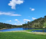 A beautiful mountain lake setting located in the 'Heart of the Black Hills'